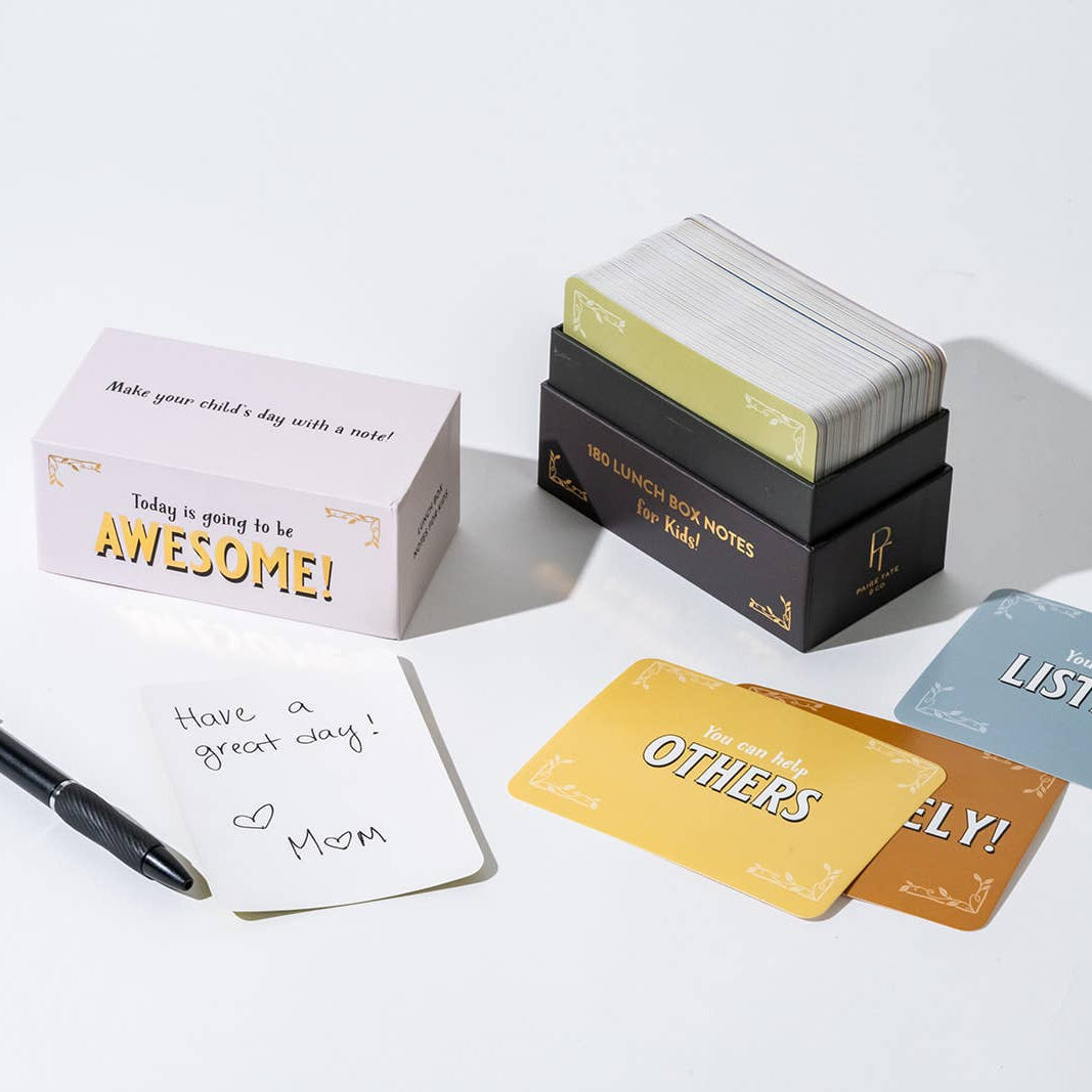 Motivational cards with a pen on a white background