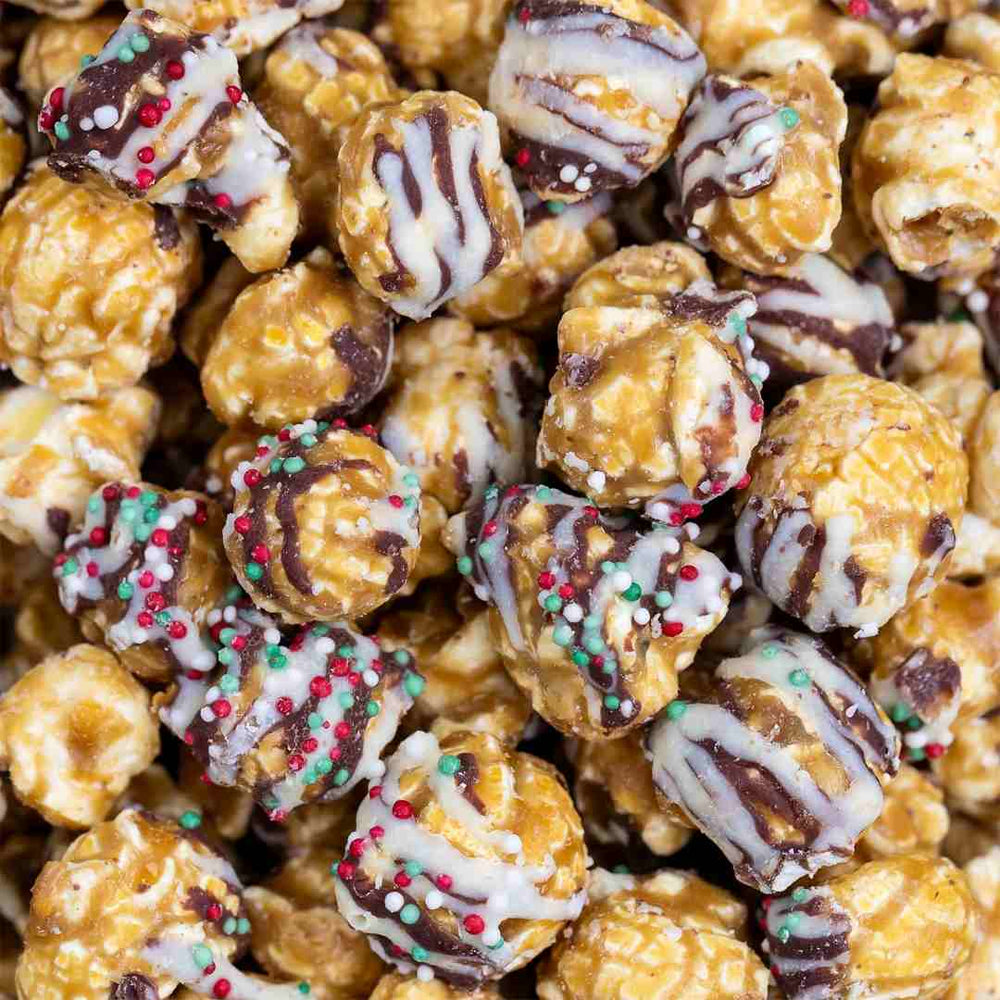 Poppy Hand-Crafted popcorn | Close-up of chocolate-dipped popcorn with sprinkles
