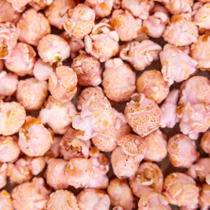 Close-up of pink popcorn with a soft focus background