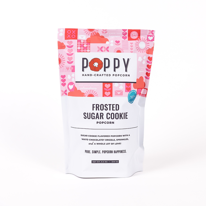 Poppy hand-crafted popcorn bag with frosted sugar cookie flavor on a white background