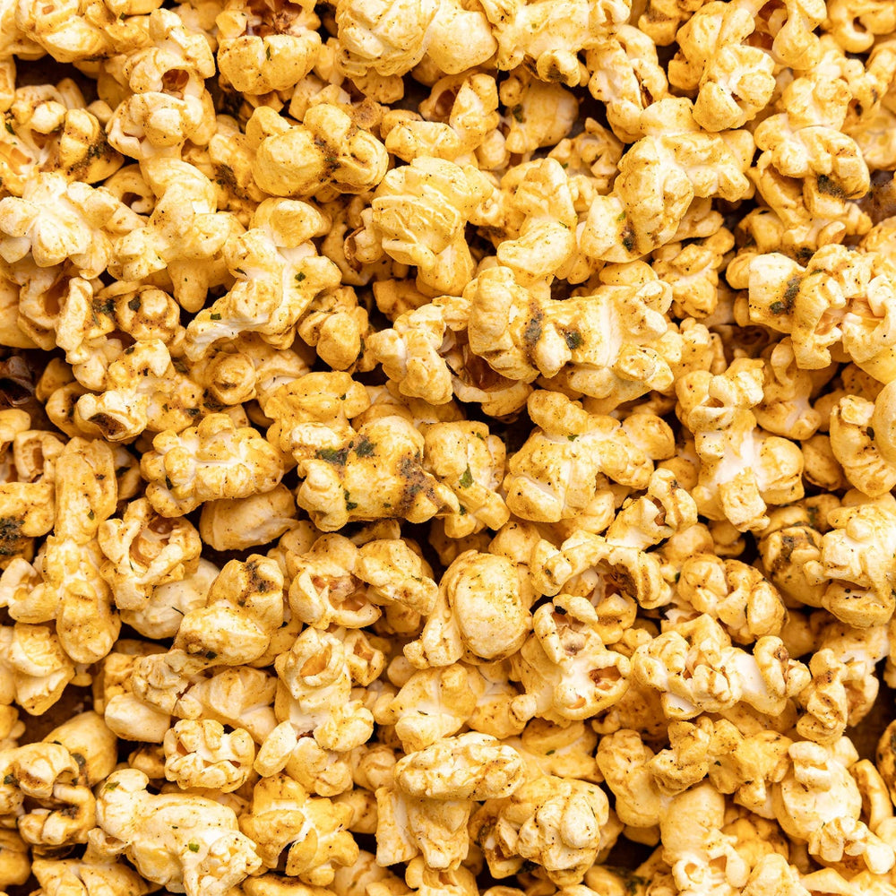 Close-up of caramel popcorn with a brown background