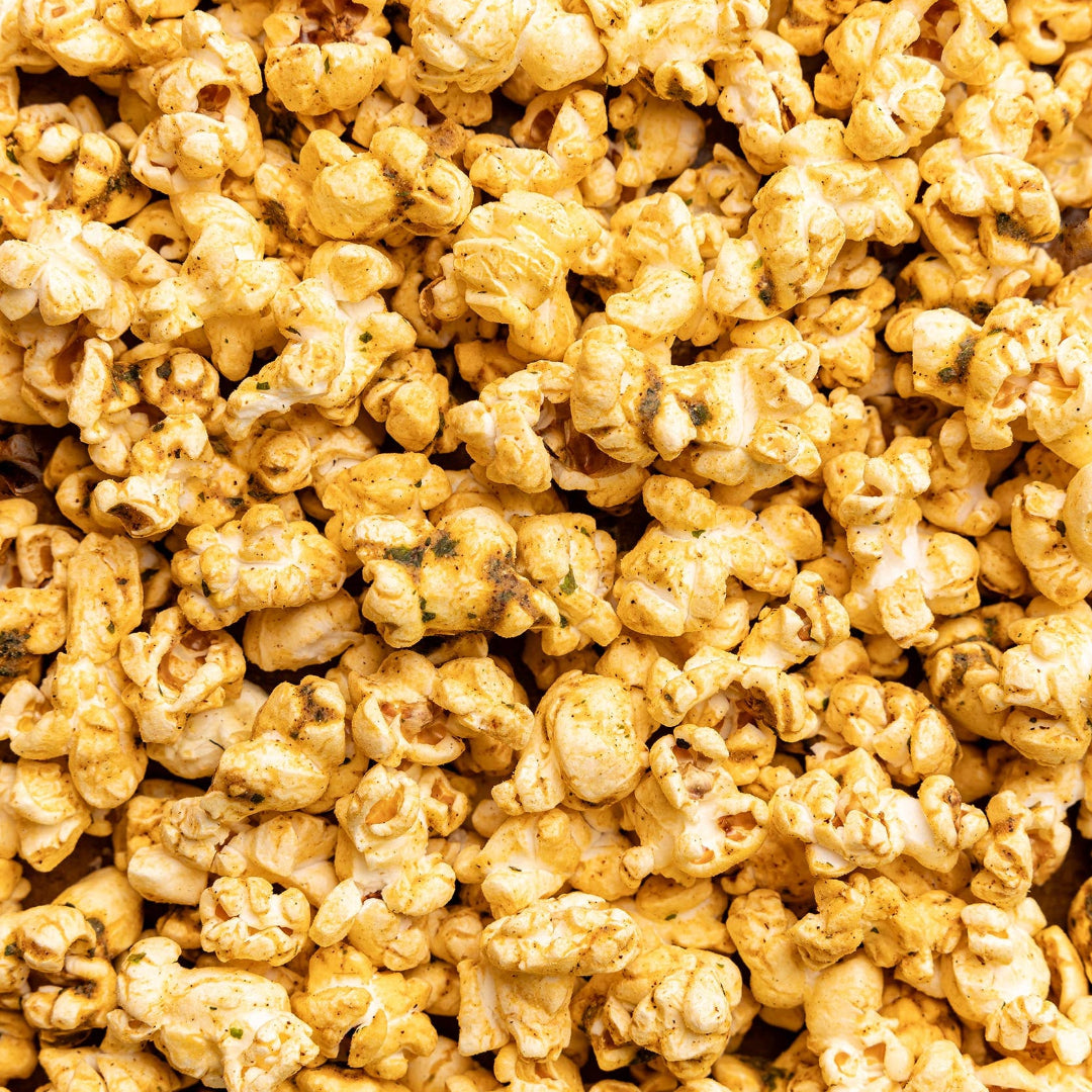 Close-up of caramel popcorn with a brown background