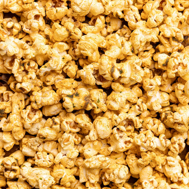 Close-up of caramel popcorn with a brown background