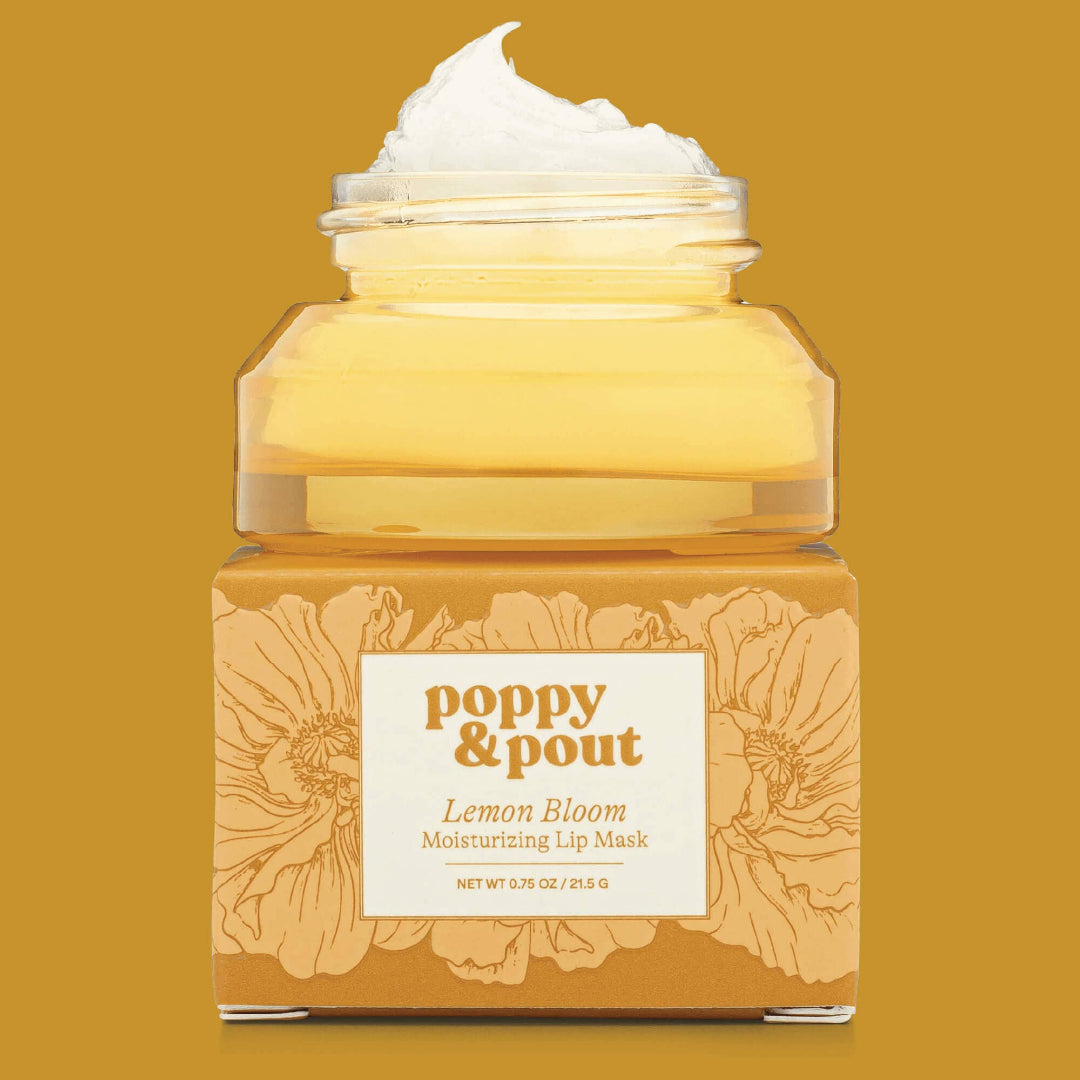 Jar of 'Poppy & Pout Lemon Bloom Moisturizing Lip Mask' on a mustard yellow background