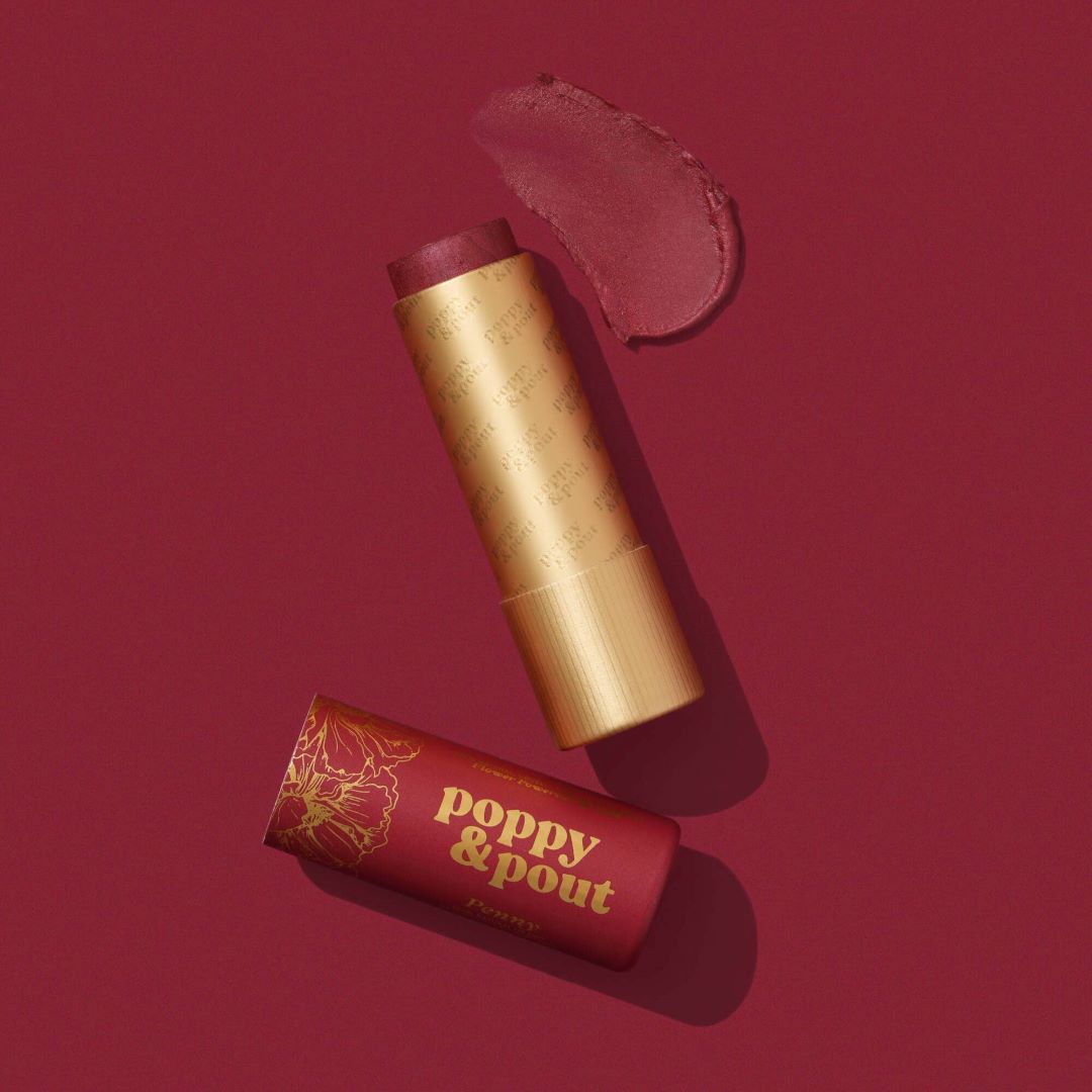 Poppy & Pout | Penny Lip Tint | Red lip tint in a gold and red package.