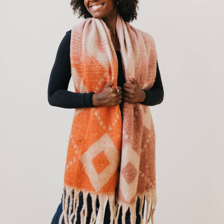 Pretty Simple | Diamond Fade Chunky Scarf: Orange/Pink/Cream | Scarf on a model for scale.