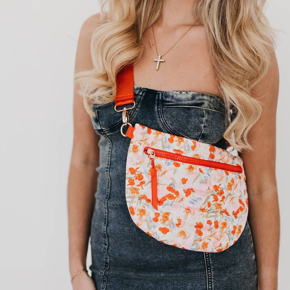 Pretty Simple | Jolly Puffer Belt Bag | Orange floral pattern.