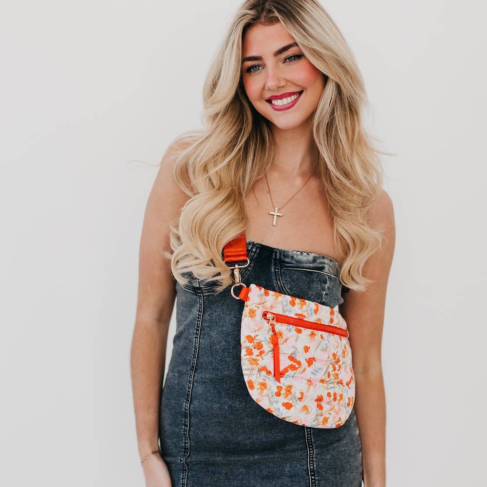 Pretty Simple | Jolly Puffer Belt Bag | Orange Floral patterned bag.