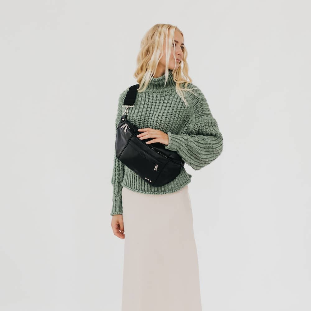 Pretty Simple | Marley Mechanic Oversized Bum Bag. Black on a model with a green sweater.