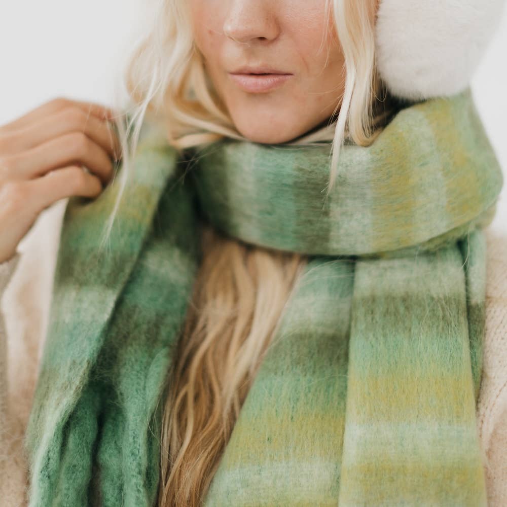 Pretty Simple | Adventure Ombre Scarf: Green | Close up on the scarf showing the striped ombre pattern.