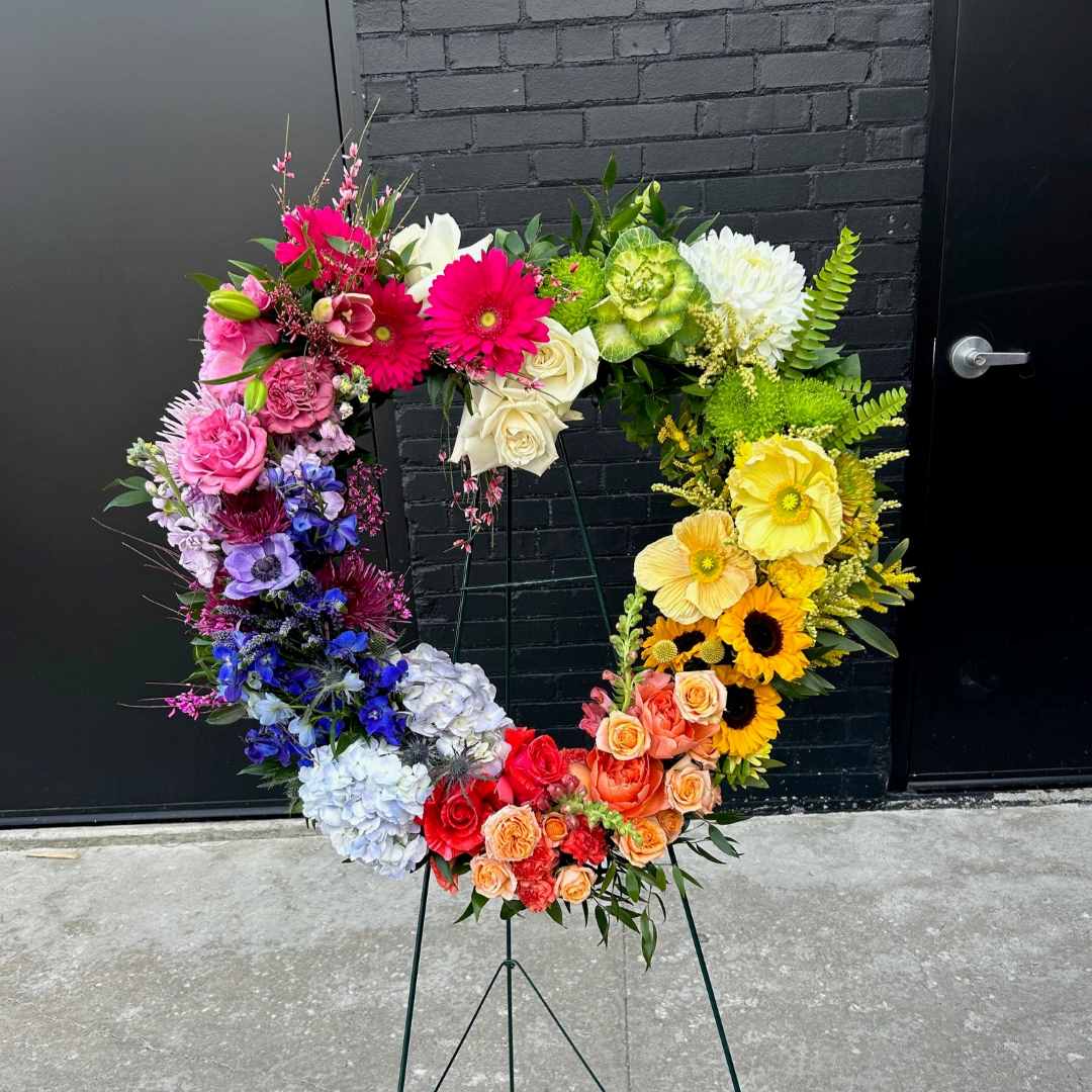 Stacy K Floral | Rainbow Sympathy with fresh flowers.