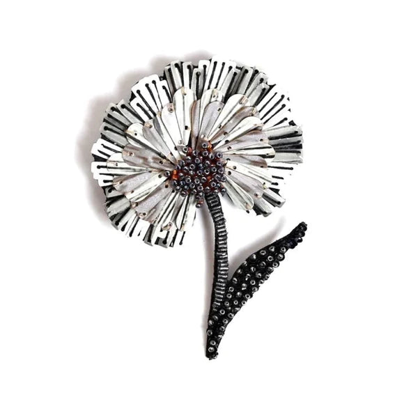 Ruffle Flower Brooch | Trovelore | A white ruffle flower with brown and black beading. Handmade and hand embroidered.