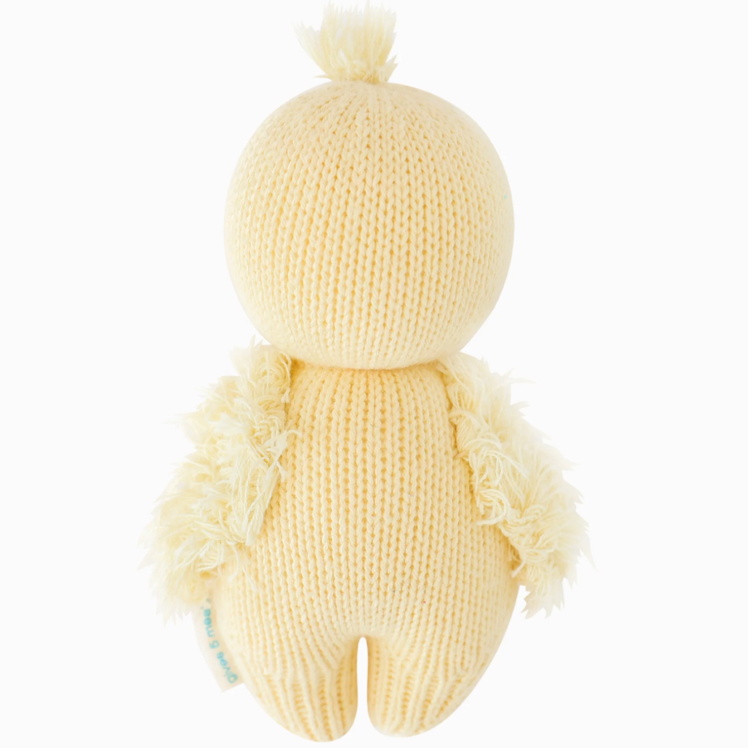Baby Duckling | Cuddle + Kind | The reverse side of the duckling. Yellow knit with fuzzy wings.
