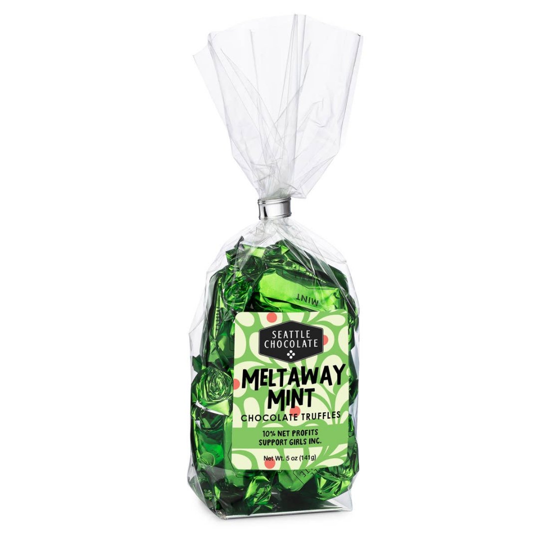 Meltaway Mint Truffle Bag | A clear bag with green individually wrapped chocolates. Text reads "Seattle chocolate, meltaway mint chocolate truffles, 10% net profits support girls inc. Net wt.  5oz (141G).