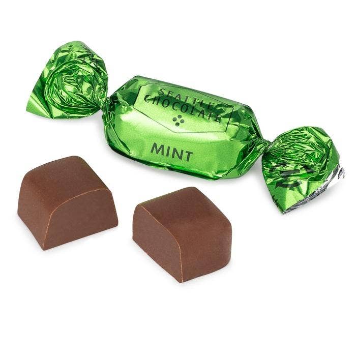 Meltaway Mint Truffle Bag | Close up on the individually wrapped chocolate. Wrapped in green.