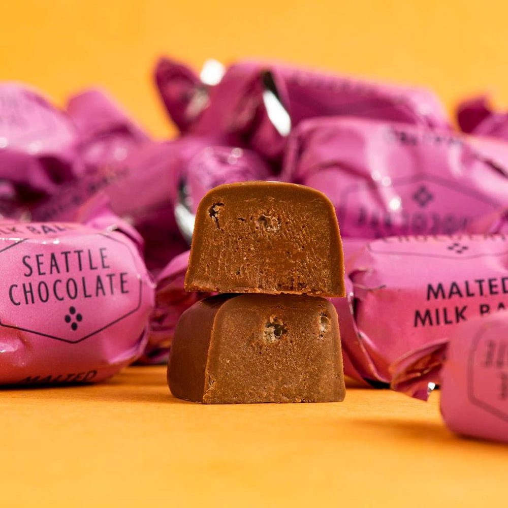 Seattle Chocolate | Malted Milk Ball Truffle Pint - 4.5oz | Close up on the interior of the chocolate truffle.