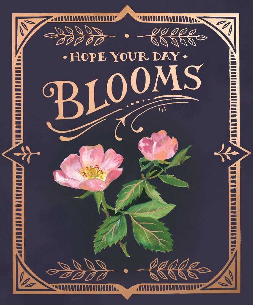 The front of the card is purple with a gold border, watercolor floral design, and text that reads "Hope your day blooms".