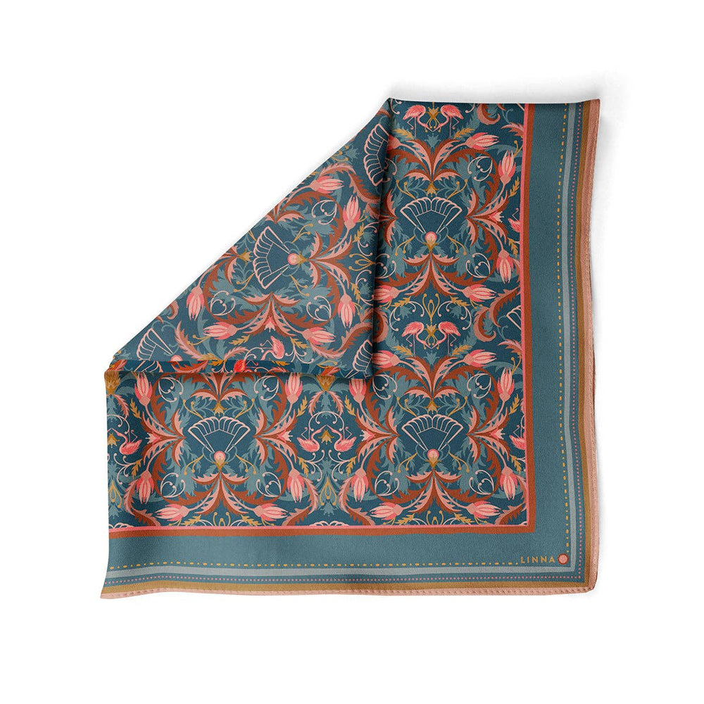 Decorative tablecloth with floral pattern on a white background