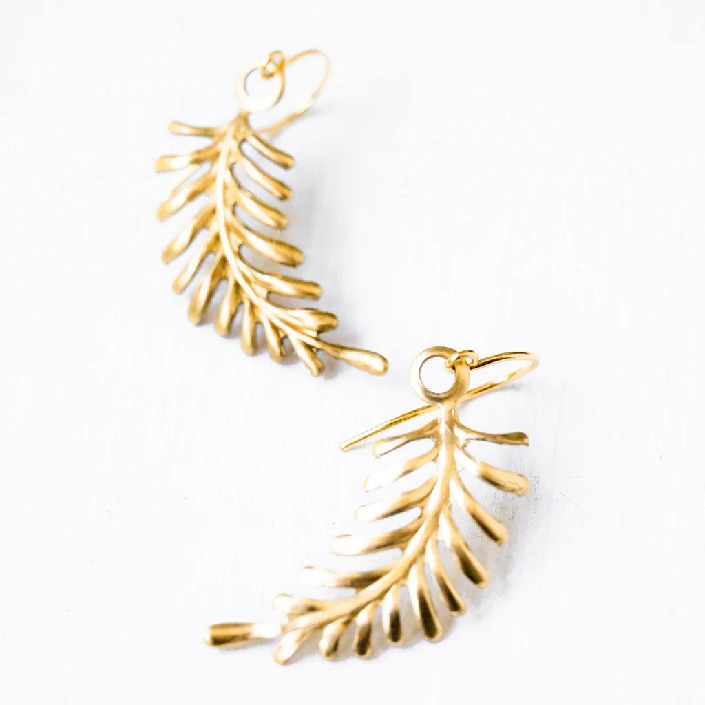 Little Branch Earrings | Gold dangling earrings shaped like a simple fern leaf.