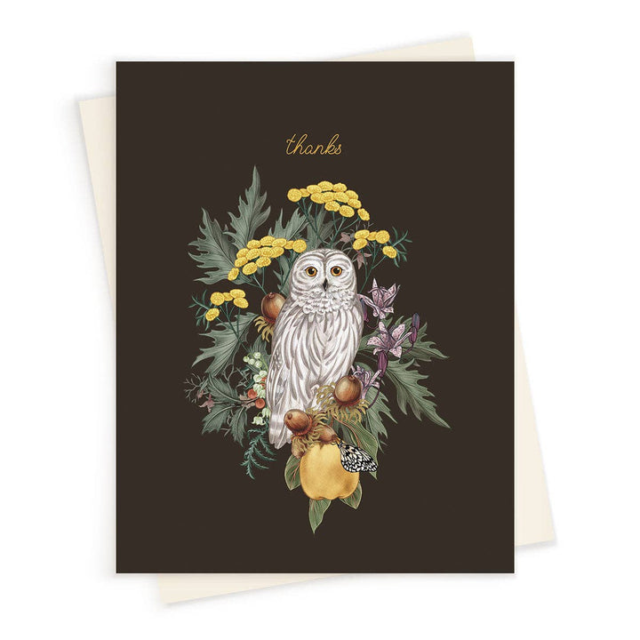 Greeting card with an owl and floral design on a dark background