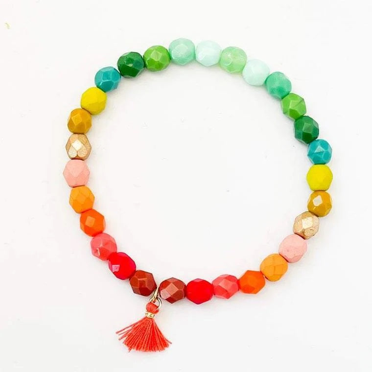 Nest Pretty Things | Stackable Bracelet with Tassels | Ombre Beaded | Orange, yellow, pink, and green.