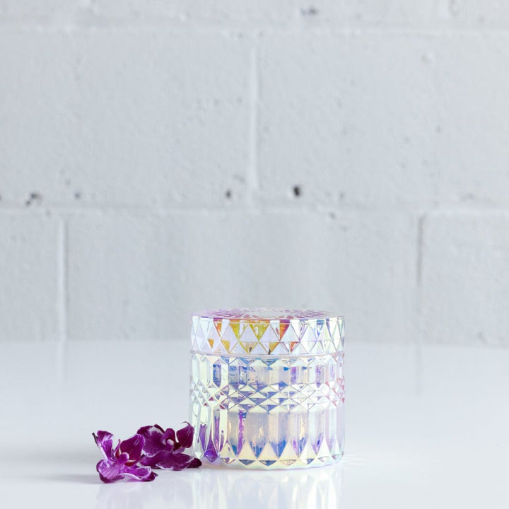 Iridescent etched candle holder with black wooden wick in Stacy k florals signature scent.