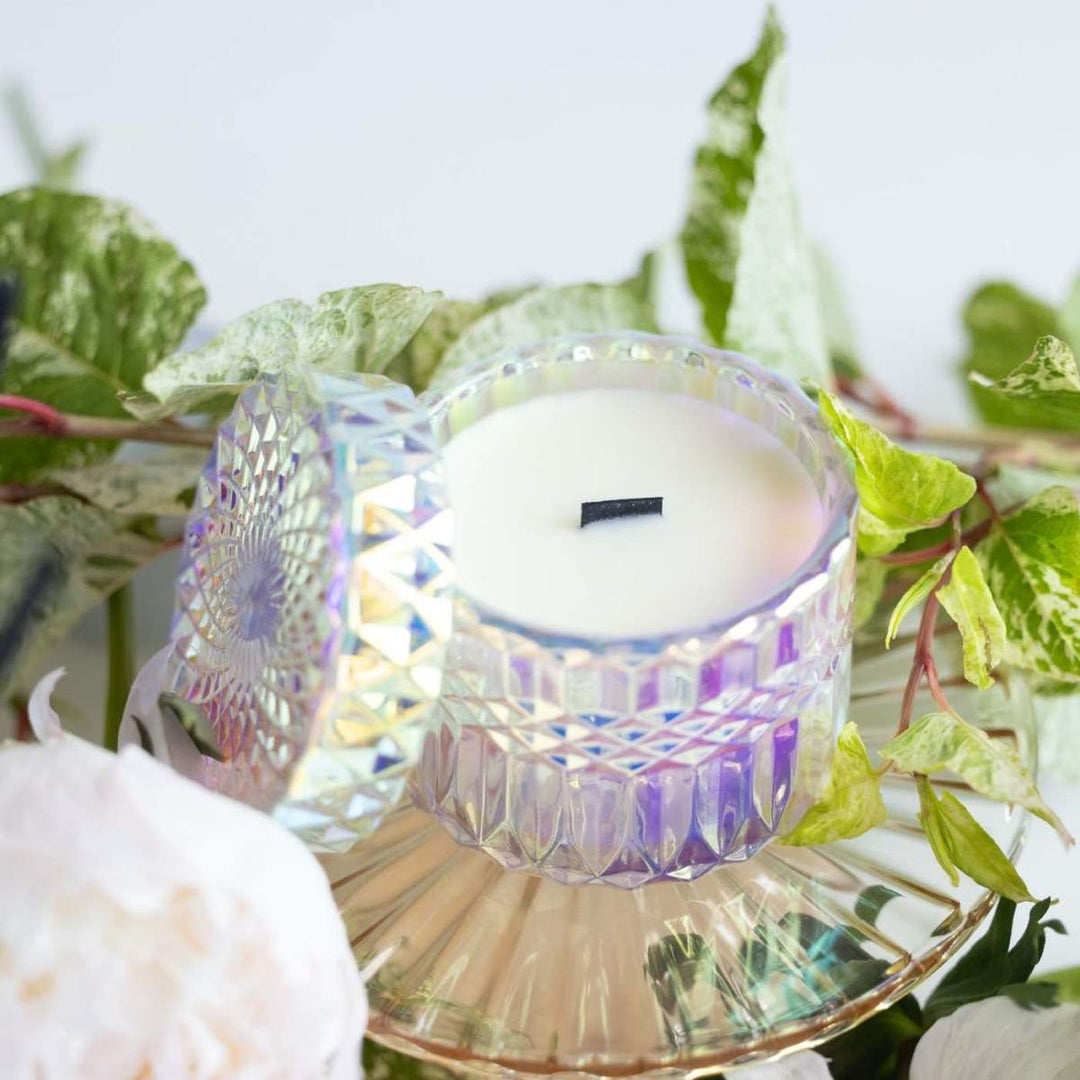 Iridescent etched candle holder with black wooden wick in Stacy k florals signature scent.