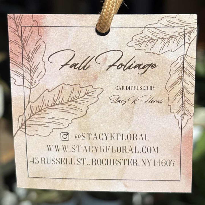 Stacy K Floral | Fleurish Co. | Fall Foliage | Card diffuser label with 'Fall Foliage' text and leaf illustrations, featuring branding and contact information.