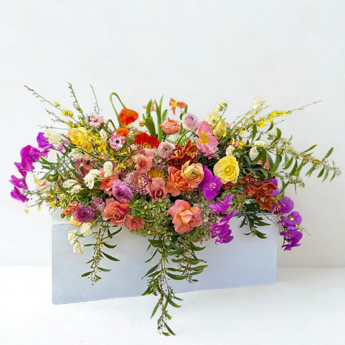 Stacy K Floral | A lush floral arrangement for placement on a casket. Same day sympathy floral delivery Rochester, NY.