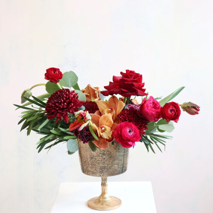 Stacy K Floral | Velvet | Fresh floral arrangement with mums, roses, orchids, ranunculus, and more. In a golden metal vase.
