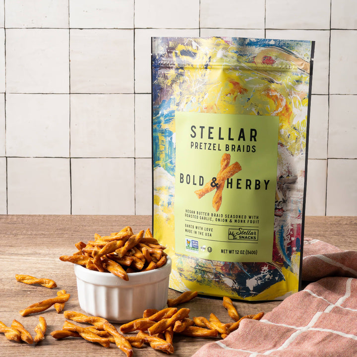 Packaging of Stellar Pretzel Breads with pretzels on a wooden surface and tiled wall background