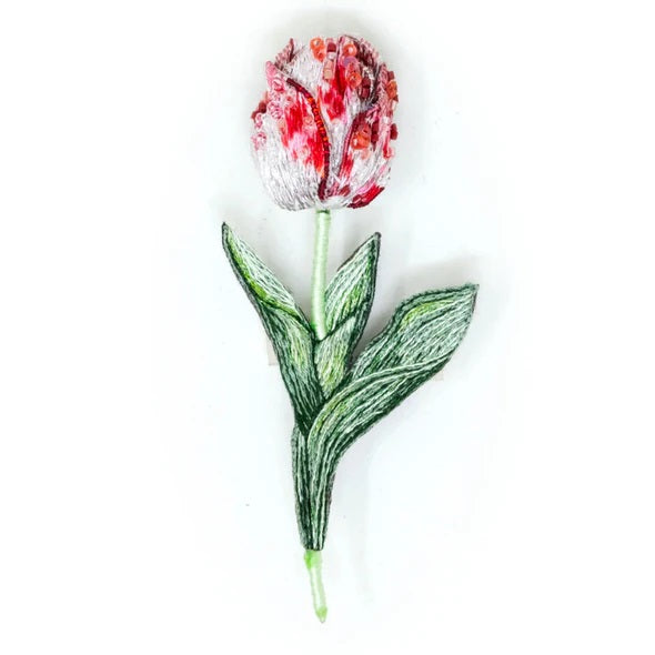 Trovelore | Striped Tulip Brooch | A green stem and leaves with red and white petals.