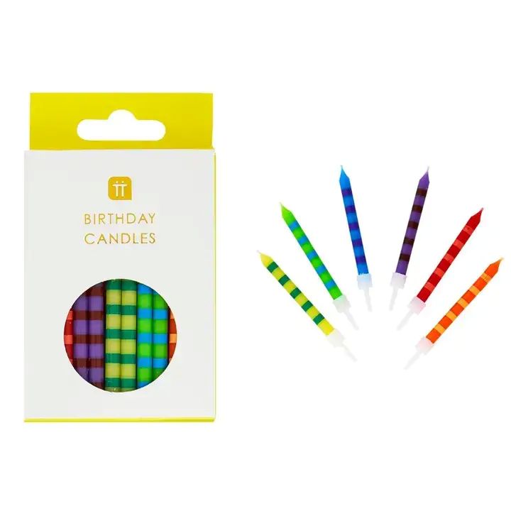 Talking Tables | Packaged colorful birthday candles with a white background