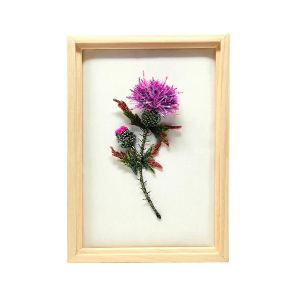 Trovelore | Thistle Beaded Art | Pink and green embroidered thistle with beads and sequins.