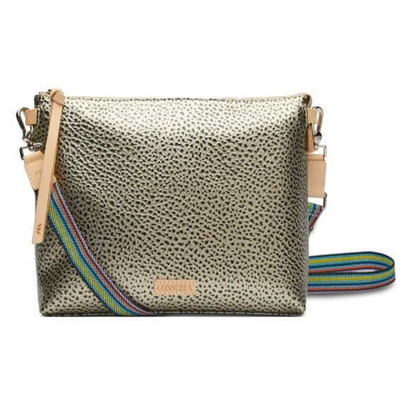 Tommy Downtown Crossbody | Consuela | A gold bag with black speckling, nude accents, and a multi color strap.