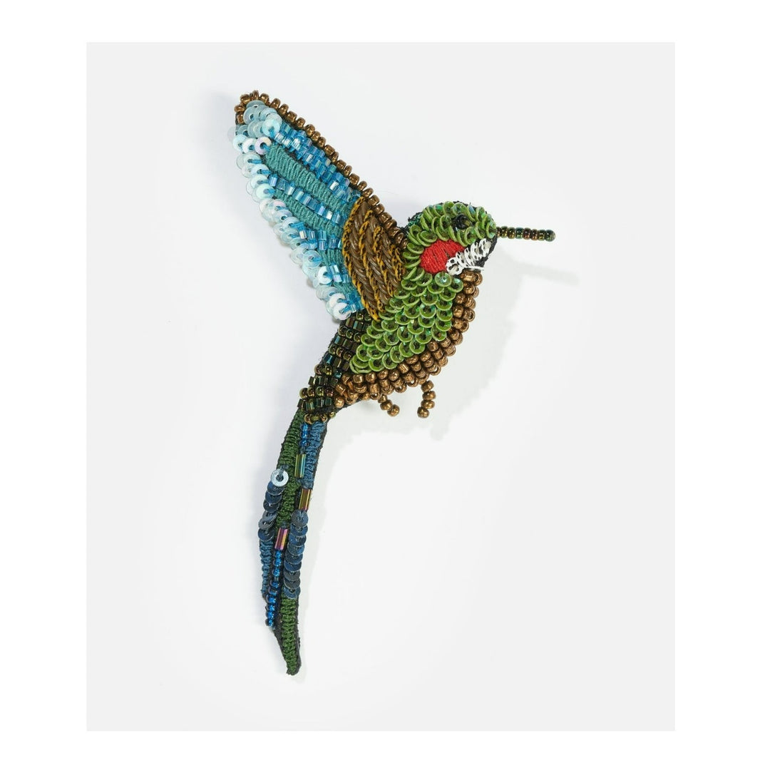 Tropical Hummingbird | Hand embroidered brooch of a tropical hummingbird. Green, blue, red, white, and gold beads.
