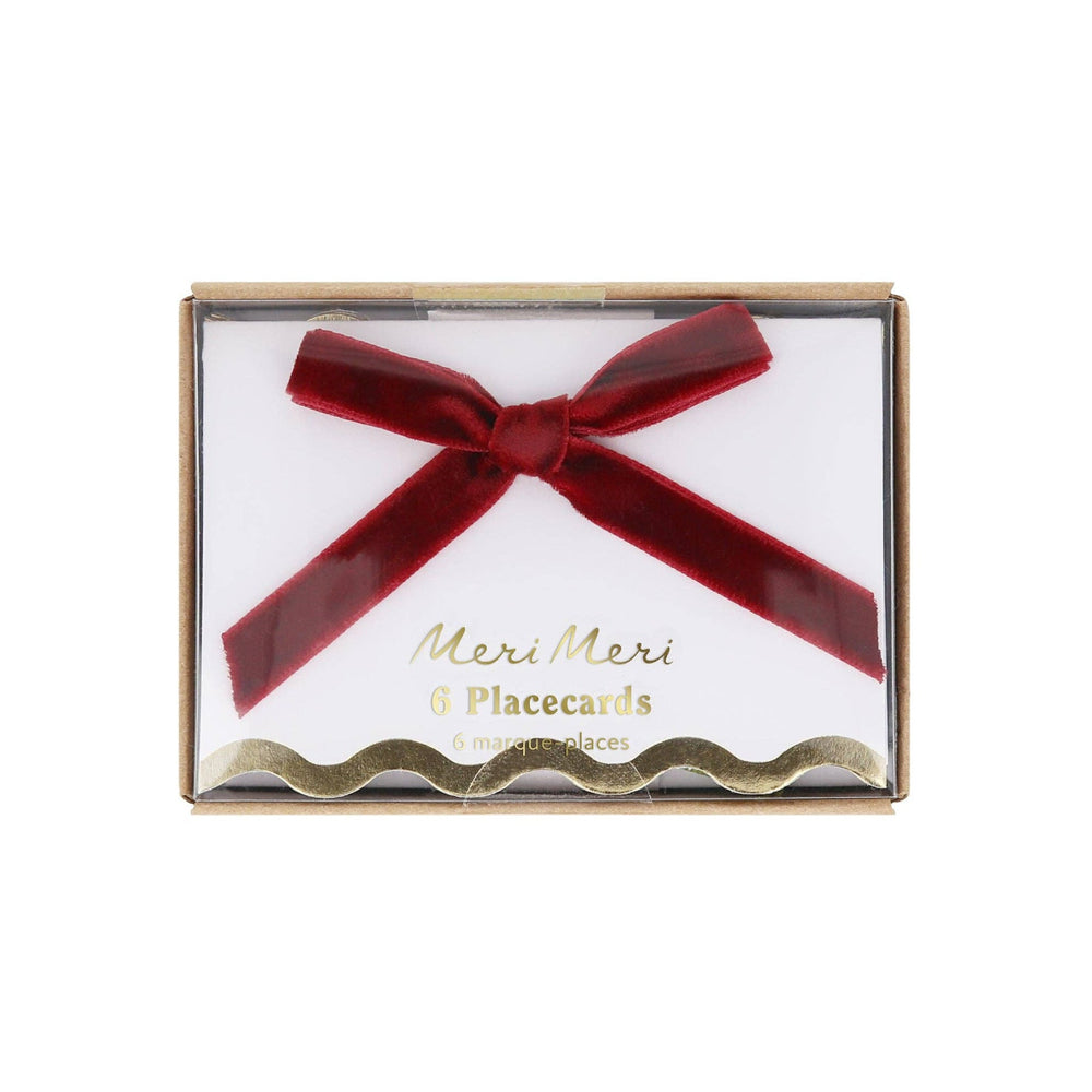 Packaged product with a red bow and 'Meri Meri' branding on a white background