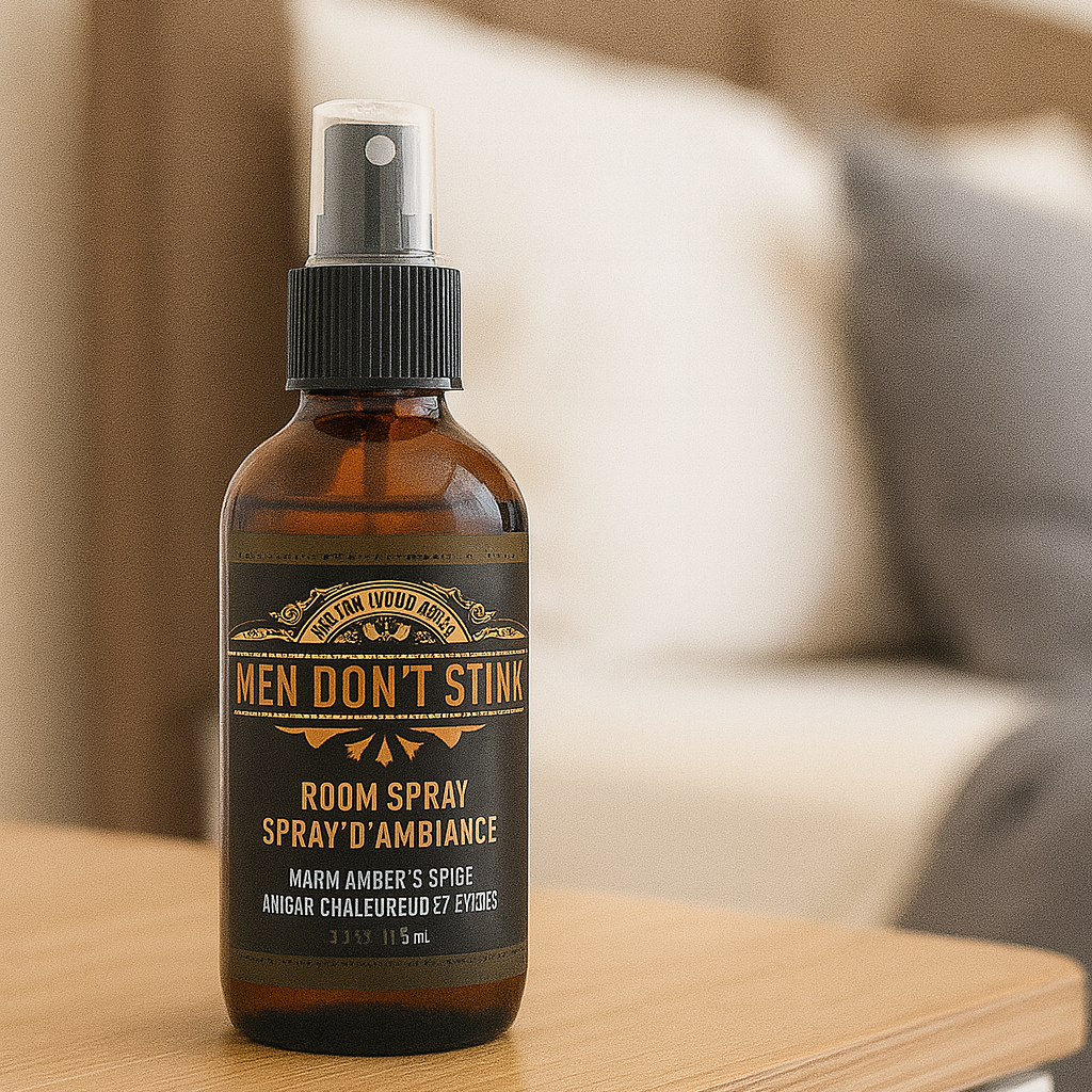 Bottle of 'Men Don't Stink' room spray on a wooden surface with a blurred background