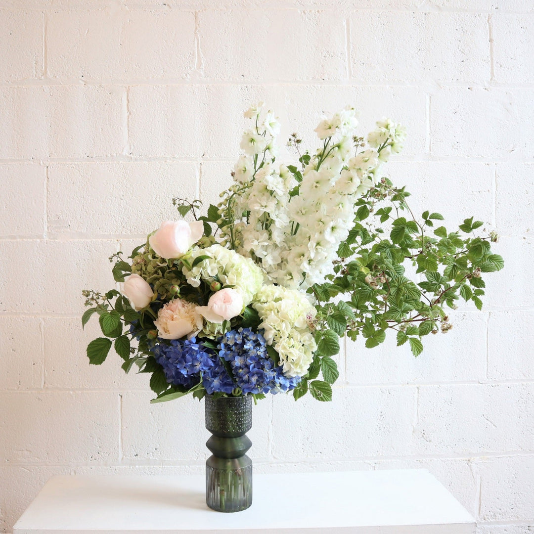 White Swan | Photo of the arrangement against a white background.