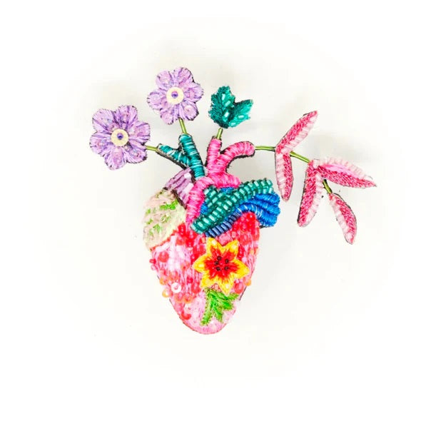 Trovelore | Wild Heart Brooch | A multicolored brooch with a heart w/ flowers growing out of it.