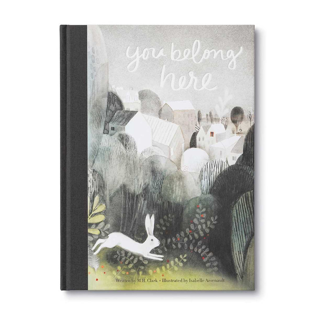 Compendium | You Belong Here | A watercolor illustrated cover with a white hare leaping towards a city in the distance.