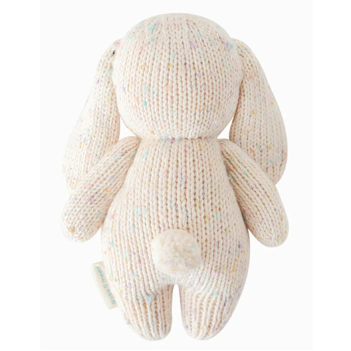 Baby Bunny | Cuddle + Kind | A reverse picture of the hand knit bunny plush showing the fluffy tail.