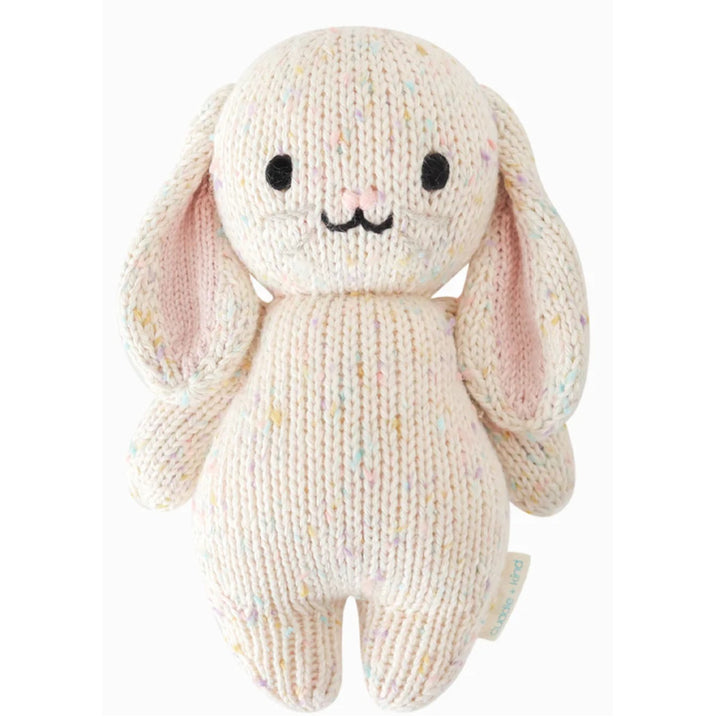 Baby Bunny | Cuddle + Kind | A cream hand knit bunny plush with a confetti pattern.