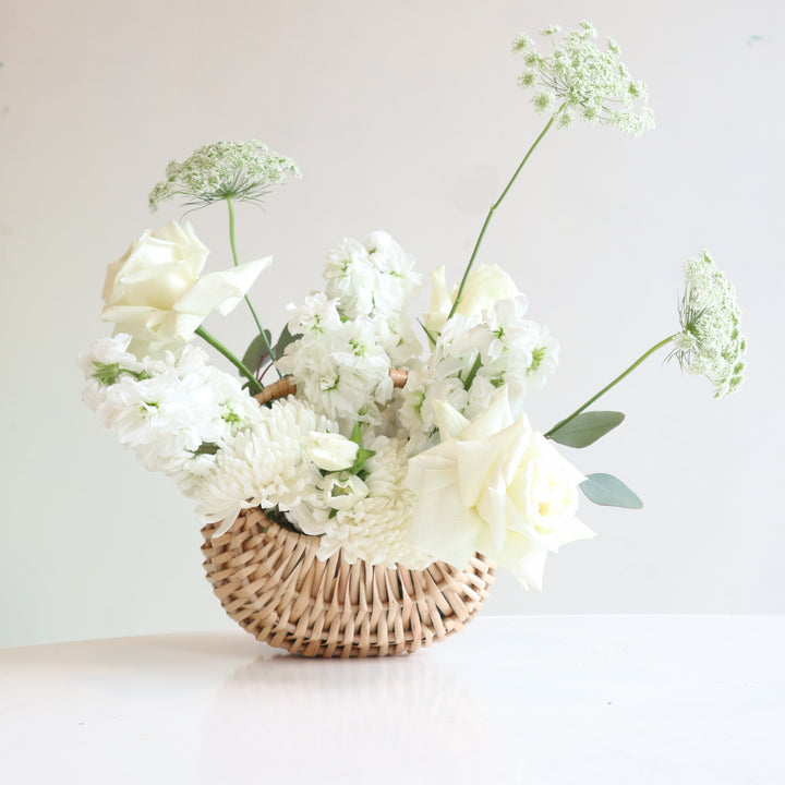 White blooms in a spring basket 