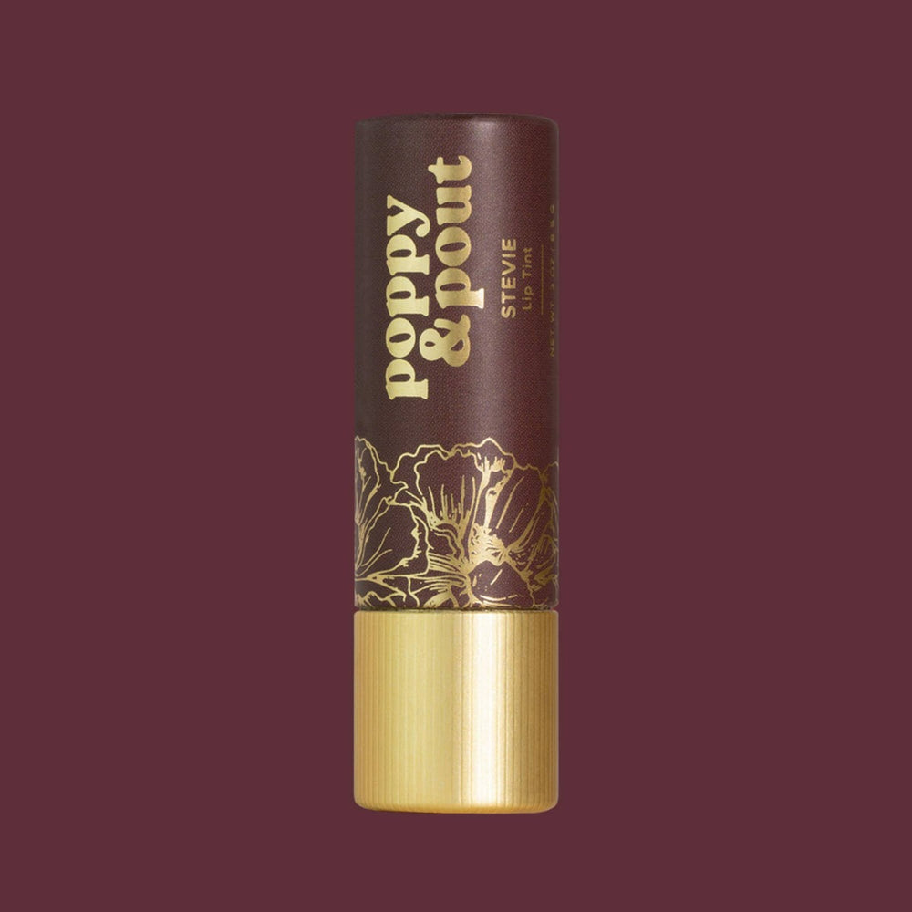 Poppy & Pout | Lip Tint, Stevie | A deep purple sleeve with gold accents.