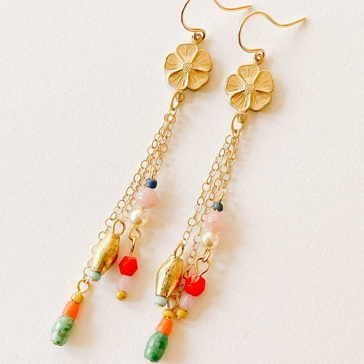 Nest Pretty Things | Long Flower Charm Earrings |  Close up on the beads and charm.