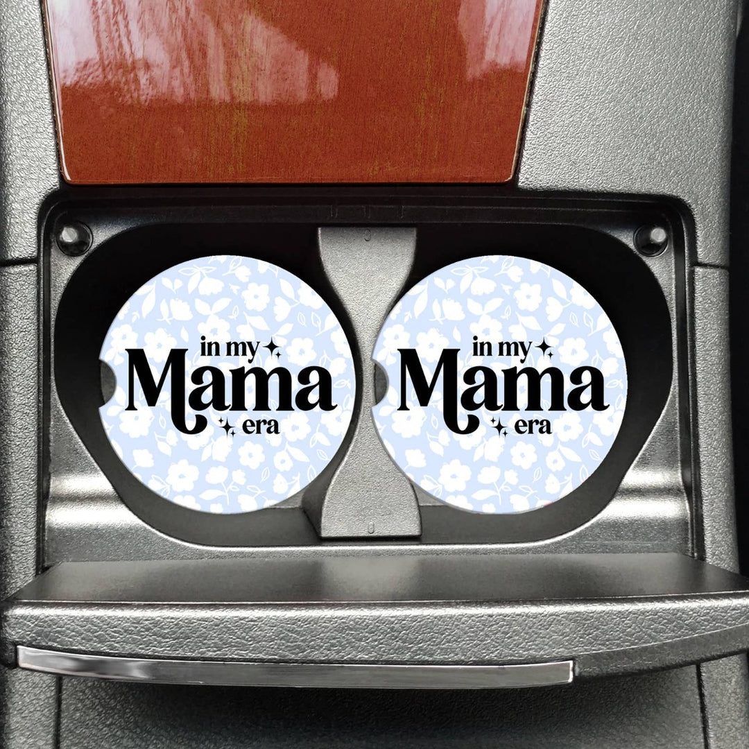 In My Mama Era Car Coasters | A light blue and white floral coaster with bold black text that reads "in my Mama era".
