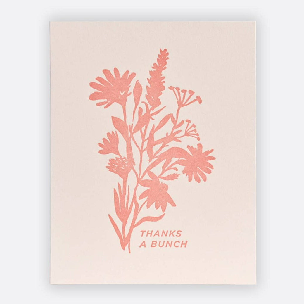 A pink card with dark pink floral outline and text that reads "Thanks a bunch".