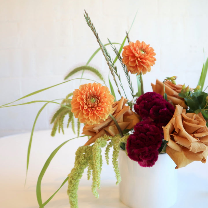Golden | Stacy K Floral | Close up in the orange dahila, ameranthus, celosia, and roses.