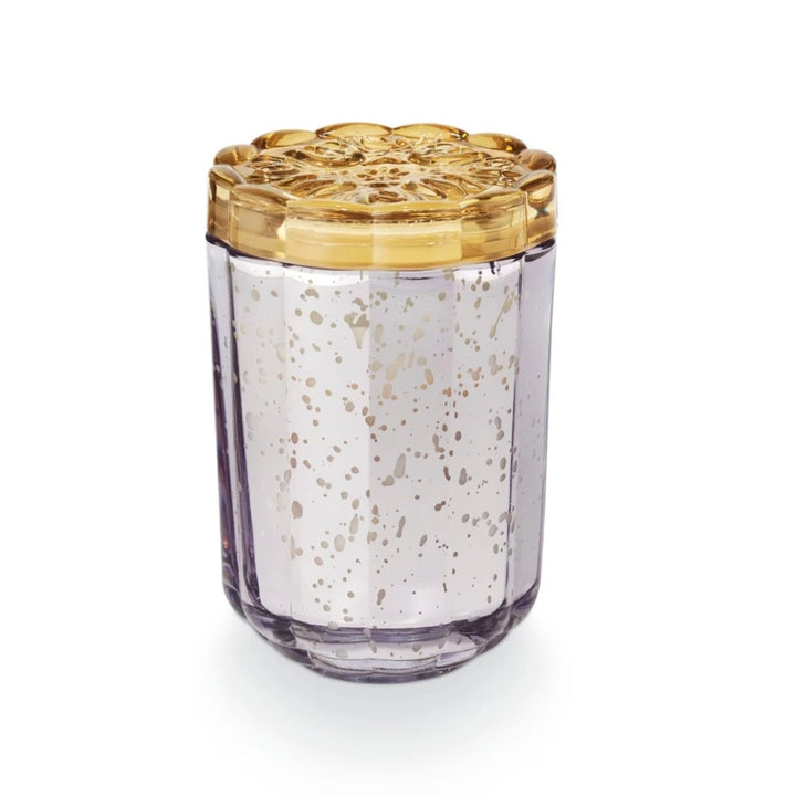 Illume Lavender La La Flourish Glass Candle | A lavender colored mercury glass candle with a flower shaped mustard yellow lid.